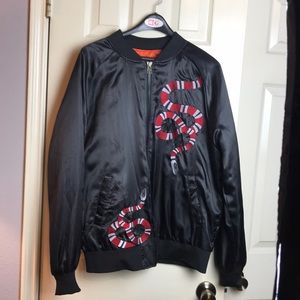 Bomber jacket with snake embroidery